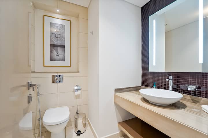 Half bathroom, High-Rise Living | Paramount Tower | 1 bedroom